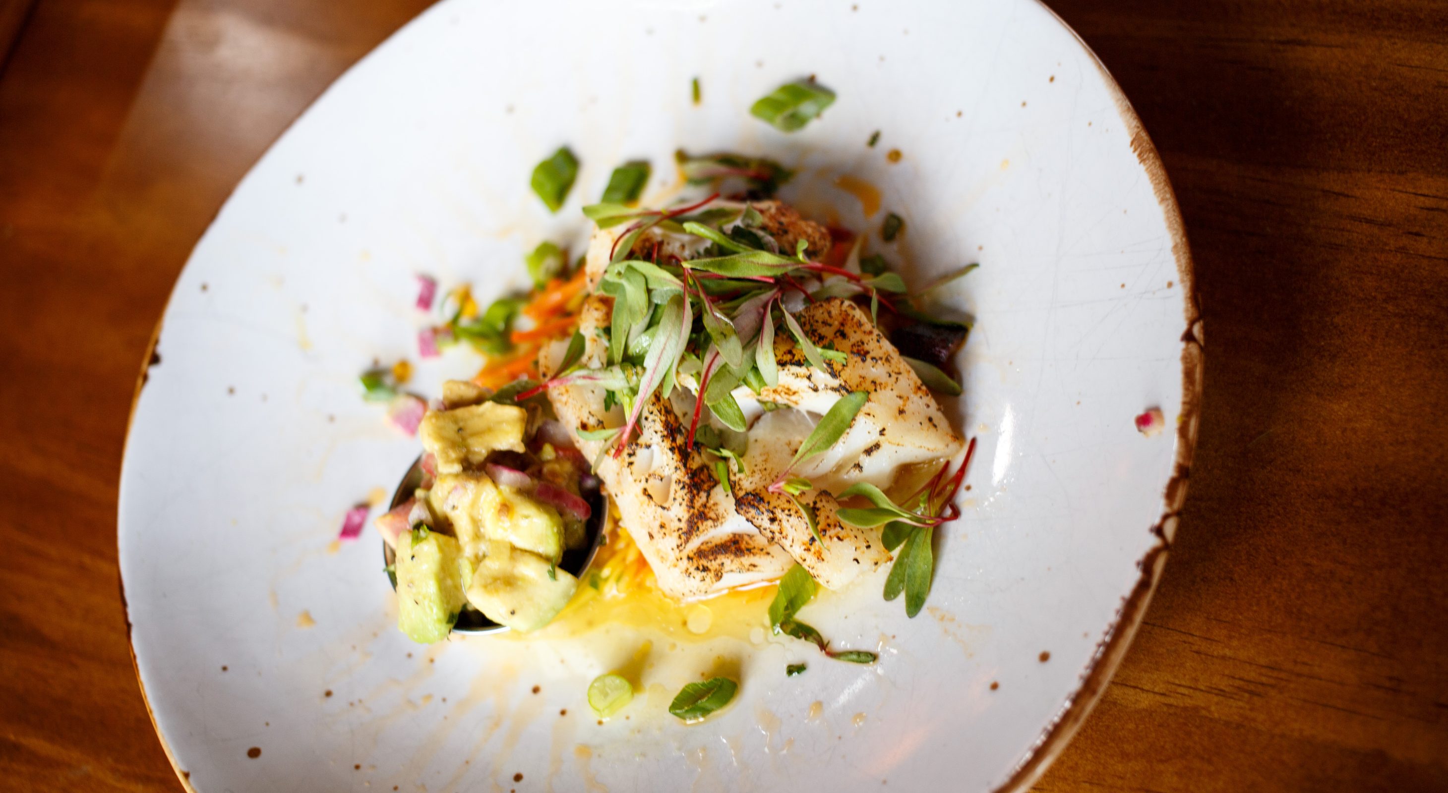 Roasted cod with diced vegetables and herbs